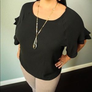 Black ruffle sleeve top
